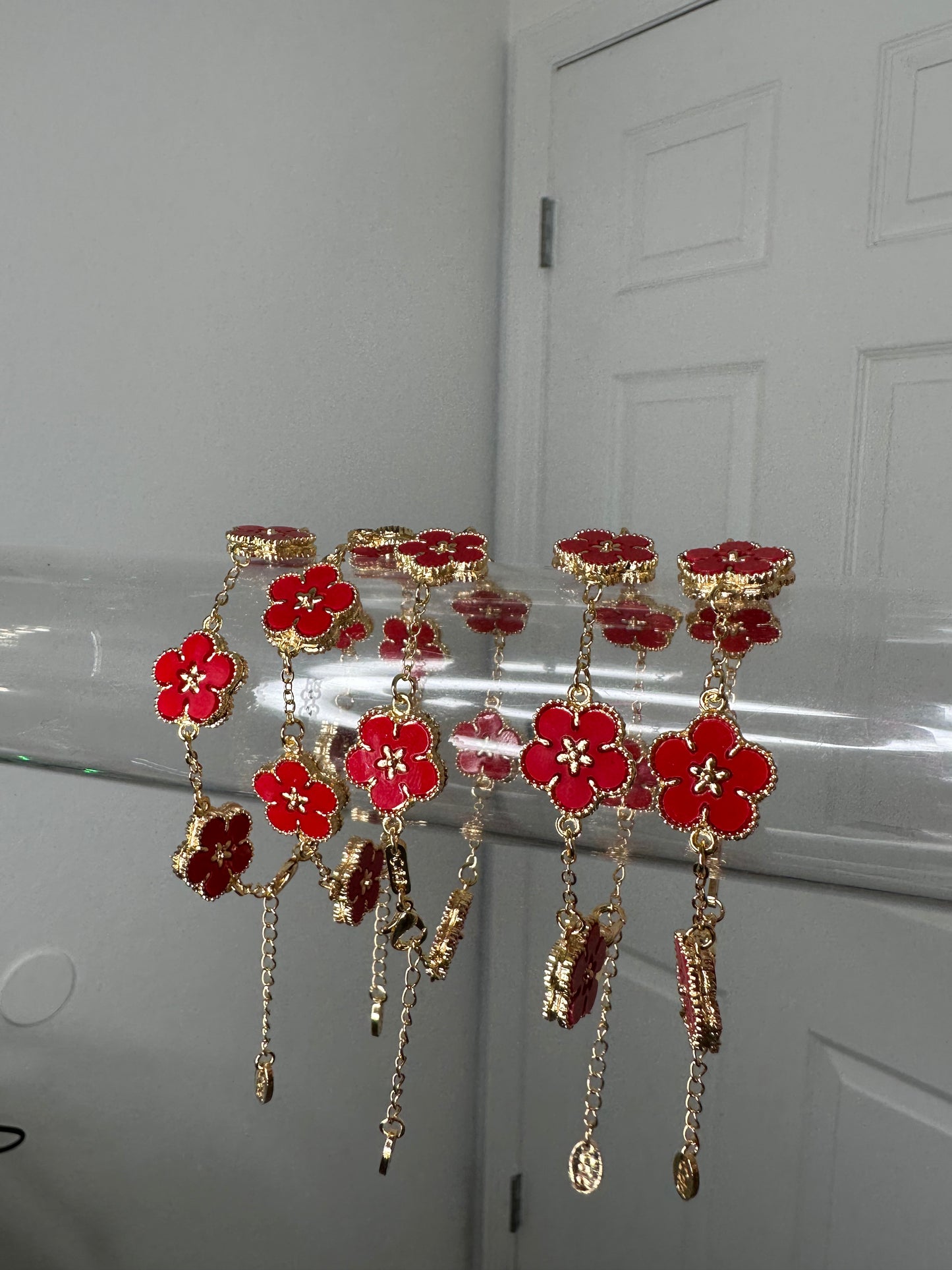 Ruby flora charm bracelet