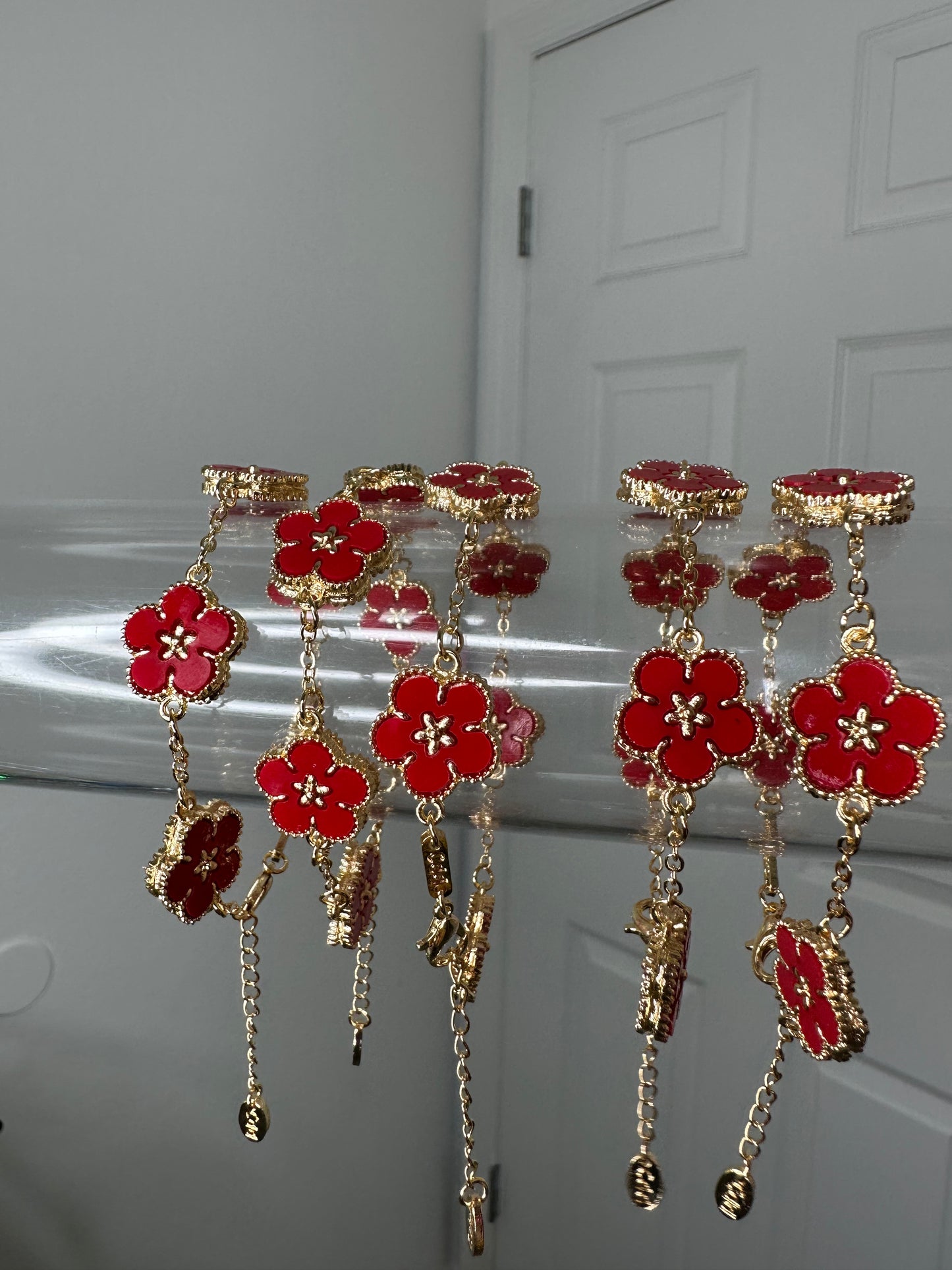 Ruby flora charm bracelet