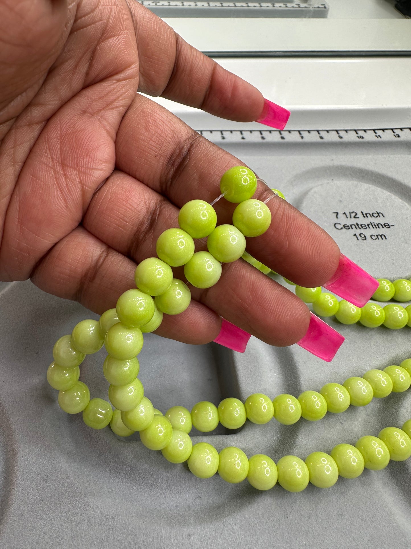 Like green bead strand