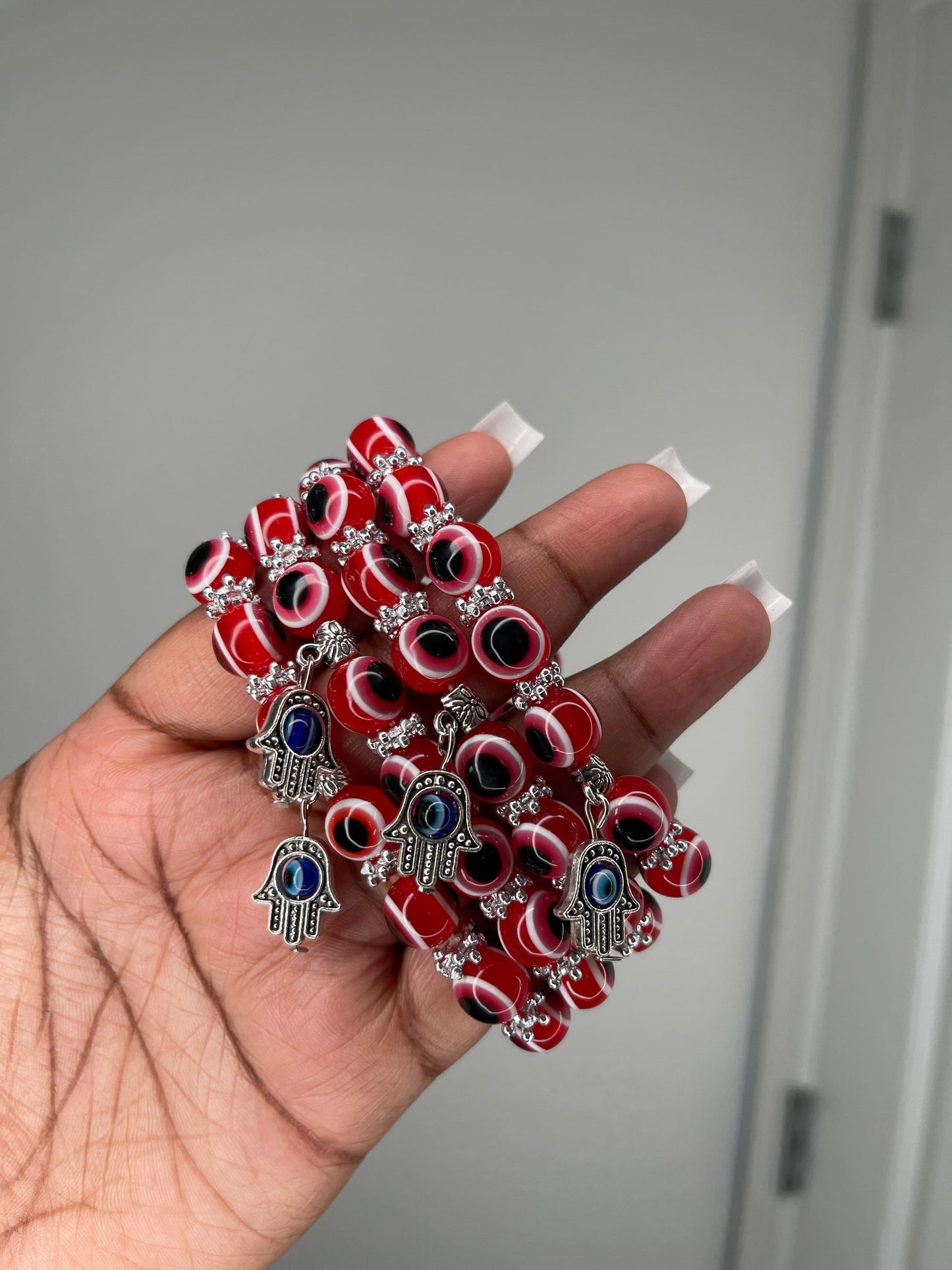 Flaming red evil eye beaded bracelet