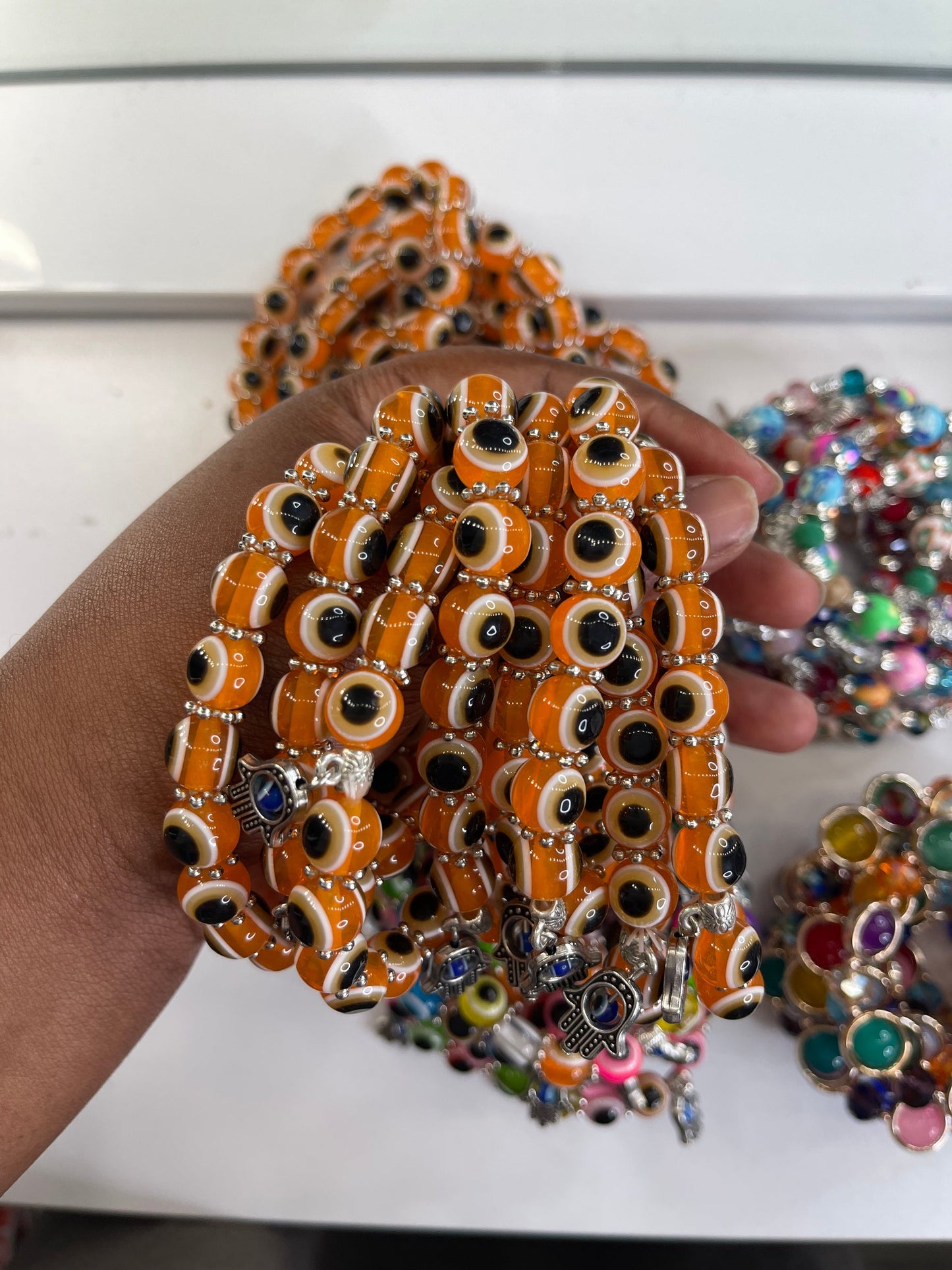 Orange evil eye beaded bracelet